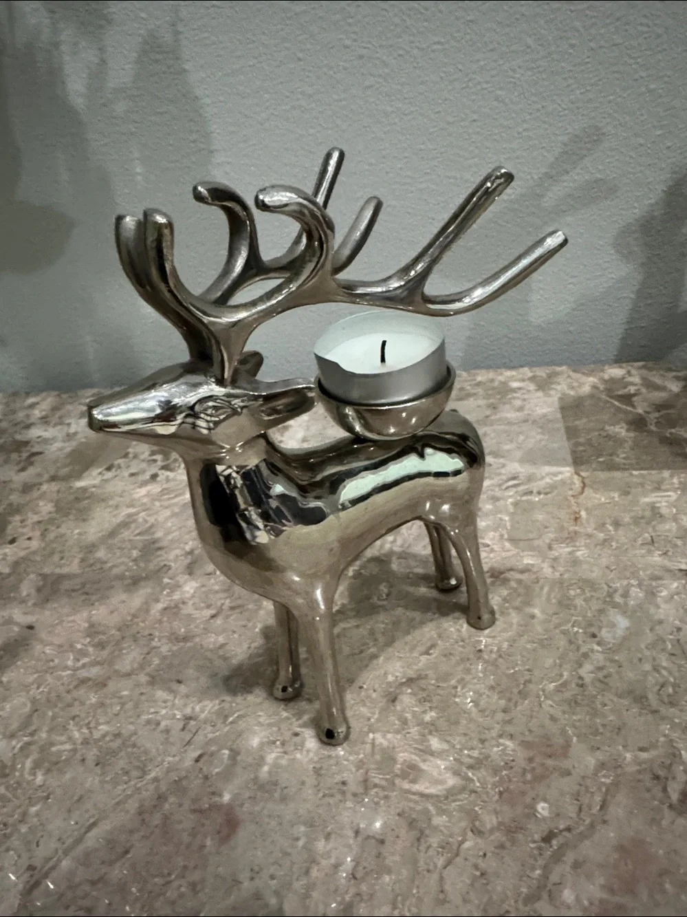 Polished chrome reindeer tea light candle Holder weighted 7.5” tall